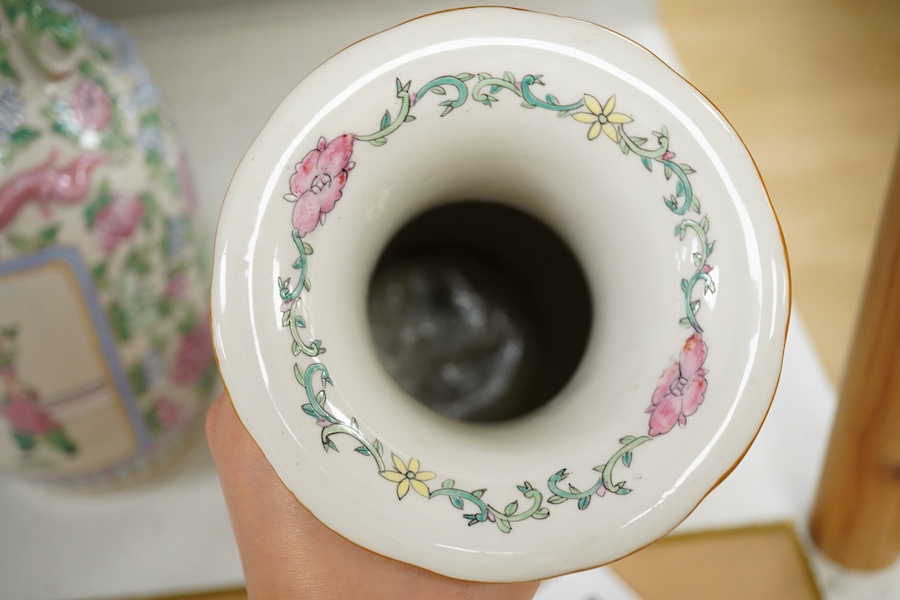 A pair of Chinese famille rose vases, 30cm high